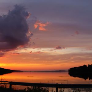 Preview wallpaper lake, clouds, sunset, sky, landscape, horizon, reflection, dark