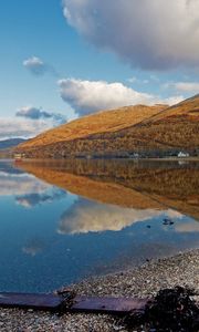 Preview wallpaper lake, coast, board, mountains, reflection, pebble, clearly