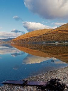 Preview wallpaper lake, coast, board, mountains, reflection, pebble, clearly