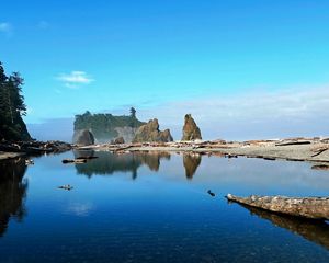 Preview wallpaper lake, coast, pebble, water, transparent, wood