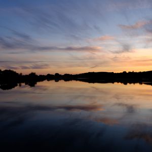 Preview wallpaper lake, dusk, reflection, trees, sky