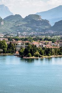 Preview wallpaper lake, embankment, trees, buildings, city