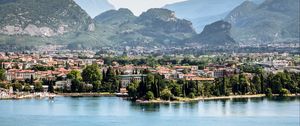 Preview wallpaper lake, embankment, trees, buildings, city