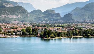 Preview wallpaper lake, embankment, trees, buildings, city