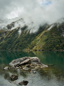 Preview wallpaper lake, fog, rocks, mountain, stone, new zealand