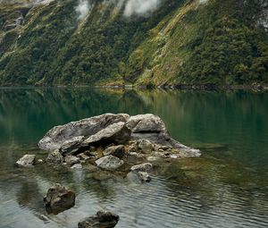 Preview wallpaper lake, fog, rocks, mountain, stone, new zealand