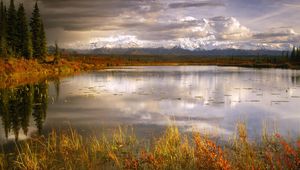 Preview wallpaper lake, grass, cloudy, bad weather, despondency, mountains