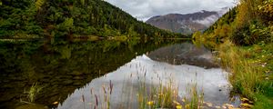 Preview wallpaper lake, grass, mountains, forest, valley