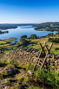 Preview wallpaper lake, grass, structure, wall, landscape