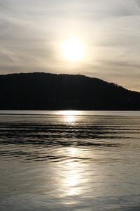 Preview wallpaper lake, hill, silhouette, sun, evening