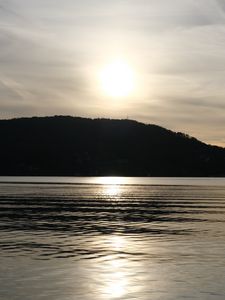 Preview wallpaper lake, hill, silhouette, sun, evening