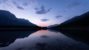 Preview wallpaper lake, hills, stones, sunset
