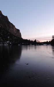 Preview wallpaper lake, ice, mountain, shore, dusk