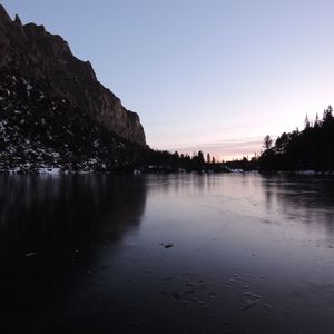 Preview wallpaper lake, ice, mountain, shore, dusk