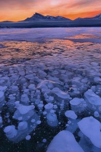 Preview wallpaper lake, ice, snow, winter, sunset, horizon