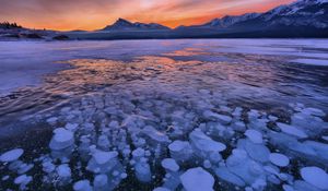 Preview wallpaper lake, ice, snow, winter, sunset, horizon