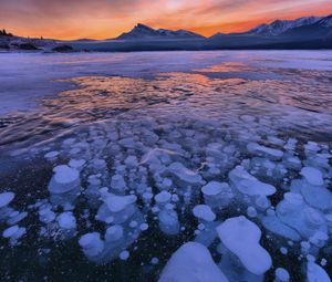 Preview wallpaper lake, ice, snow, winter, sunset, horizon