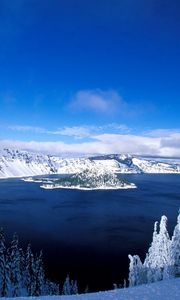 Preview wallpaper lake, island, winter, trees, snow, mountains