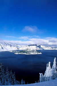 Preview wallpaper lake, island, winter, trees, snow, mountains