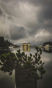 Preview wallpaper lake, lightning, thunderstorm, mountains, buildings