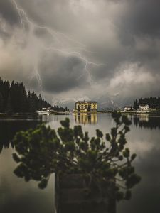 Preview wallpaper lake, lightning, thunderstorm, mountains, buildings