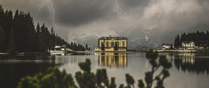 Preview wallpaper lake, lightning, thunderstorm, mountains, buildings