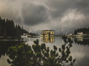 Preview wallpaper lake, lightning, thunderstorm, mountains, buildings