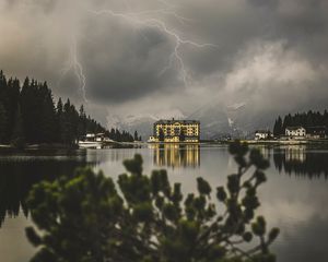 Preview wallpaper lake, lightning, thunderstorm, mountains, buildings