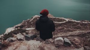 Preview wallpaper lake, man, loneliness, cliff, rocks