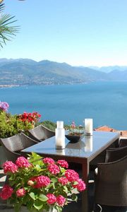 Preview wallpaper lake, mountain, balcony, view, mood, pleasure, relaxation, italy, stresa, maggiore