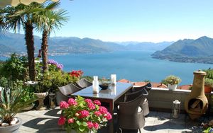 Preview wallpaper lake, mountain, balcony, view, mood, pleasure, relaxation, italy, stresa, maggiore