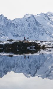 Preview wallpaper lake, mountain, snow, people, travel, nature