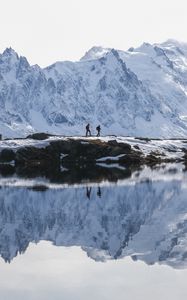 Preview wallpaper lake, mountain, snow, people, travel, nature