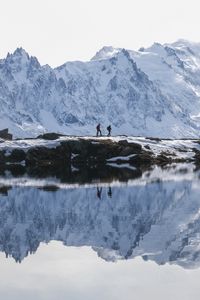 Preview wallpaper lake, mountain, snow, people, travel, nature