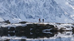 Preview wallpaper lake, mountain, snow, people, travel, nature