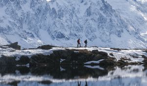 Preview wallpaper lake, mountain, snow, people, travel, nature