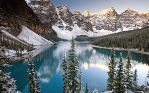 Preview wallpaper lake, mountain tops, fir-trees, water table