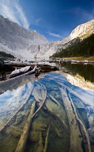 Preview wallpaper lake, mountain, water, logs, landscape