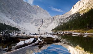 Preview wallpaper lake, mountain, water, logs, landscape