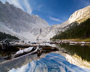 Preview wallpaper lake, mountain, water, logs, landscape