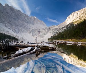 Preview wallpaper lake, mountain, water, logs, landscape