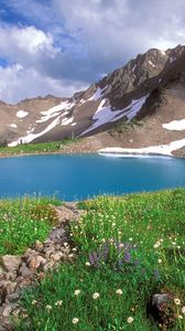 Preview wallpaper lake, mountains, alpes, greens, national park, blue water, stones