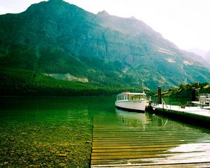 Preview wallpaper lake, mountains, bottom, transparent, water, boat, walking