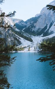 Preview wallpaper lake, mountains, branches, landscape, italy