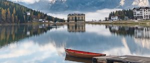 Preview wallpaper lake, mountains, buildings, pier, boat, landscape