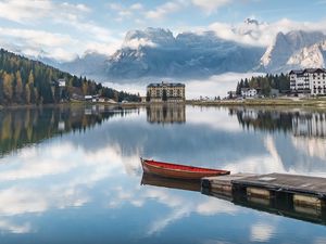 Preview wallpaper lake, mountains, buildings, pier, boat, landscape