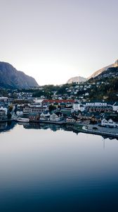 Preview wallpaper lake, mountains, buildings, city, aerial view