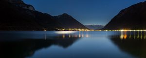 Preview wallpaper lake, mountains, city, lights, night, reflection