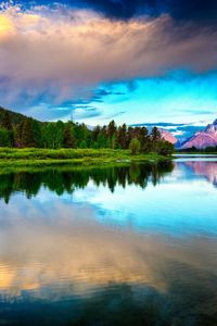 Preview wallpaper lake, mountains, clouds, sky, brightly, water smooth surface, contrast