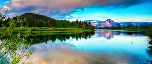 Preview wallpaper lake, mountains, clouds, sky, brightly, water smooth surface, contrast